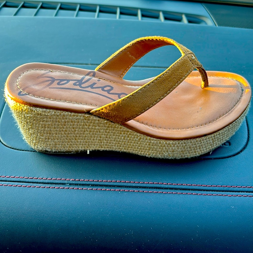 Beautiful slippers on small platforms.